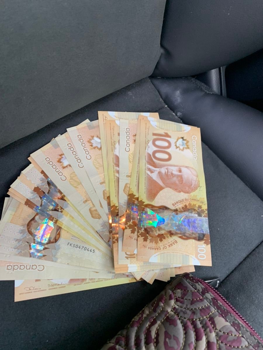100 CAD BILLS